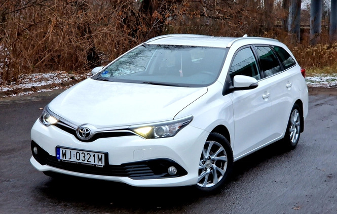 Toyota Auris cena 36900 przebieg: 223000, rok produkcji 2015 z Warszawa małe 704